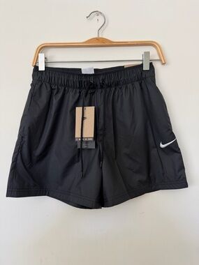 Woman’s Nike Black Athletic Shorts with White Swoosh